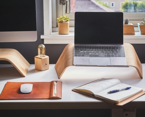 Free A stylish and contemporary home office setup with laptop and desk accessories. Stock Photo